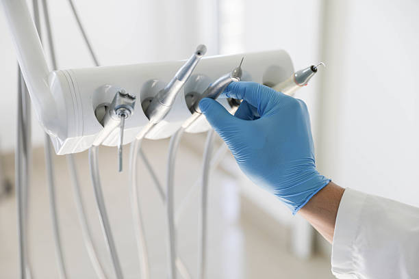 Professional Tooth Extraction technician working in Craven County County, NC